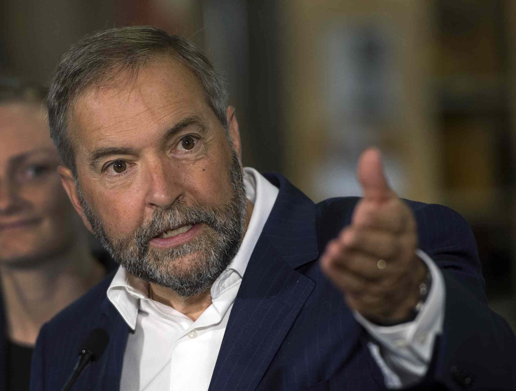 Federal New Democratic Party leader Thomas Mulcair speaks to the media Tuesday, August 11, 2015 in Mascouche, Que. THE CANADIAN PRESS/Ryan Remiorz